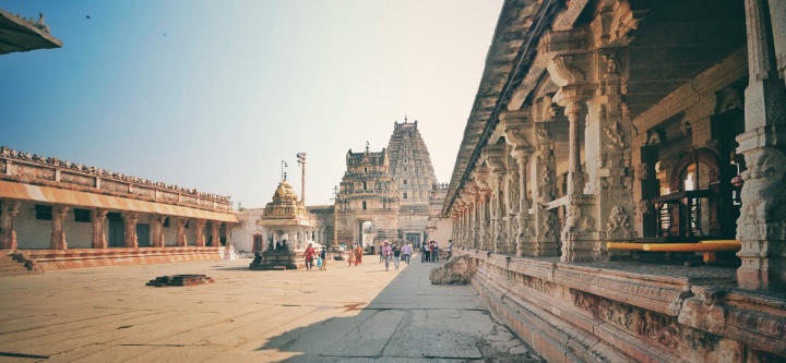Inside the Virupaksha Temple, including both it's entrance gates/towers.